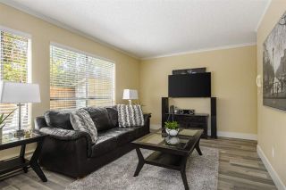 Photo 1: 101 206 E 15TH Street in North Vancouver: Central Lonsdale Condo for sale in "Lions Gate Manor" : MLS®# R2569602