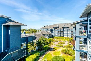 Photo 1: 422 12931 RAILWAY AVENUE in Richmond: Steveston South Condo for sale in "BRITANNIA" : MLS®# R2670071